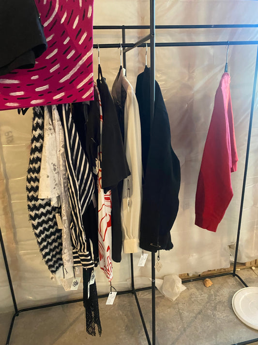 first rack of custom clothes