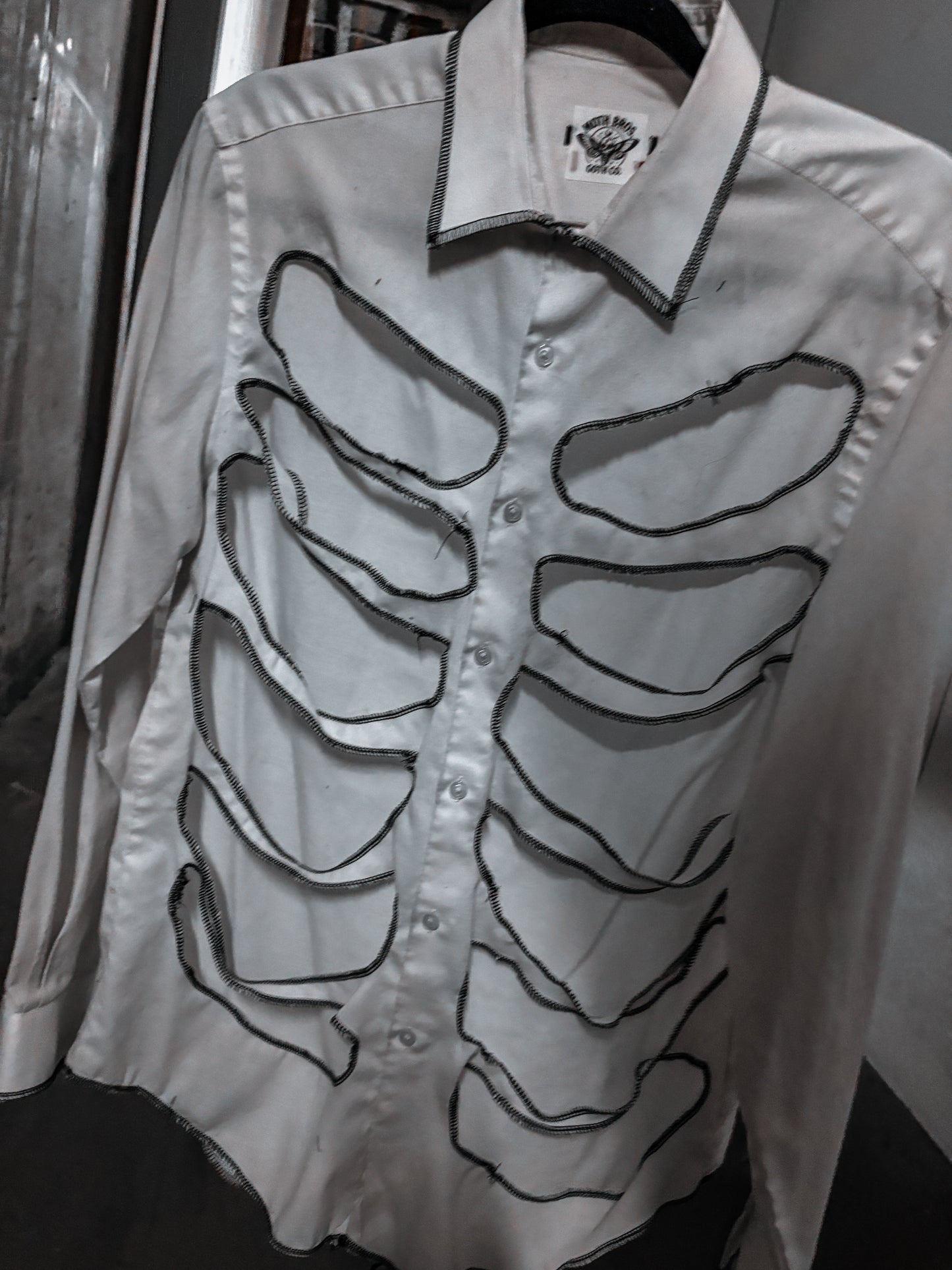 “Bare Bones” — Ribcage Cutout Button Down