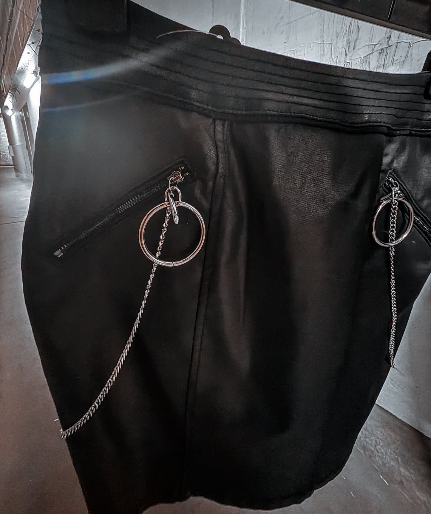 “Chain Reaction” — Vegan Leather Skirt with Industrial Hardware